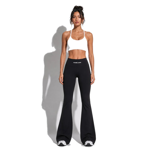 Set — Infinity bra white + Scrunch Butt Leggings black front on-model 2048 (floor-length flare)