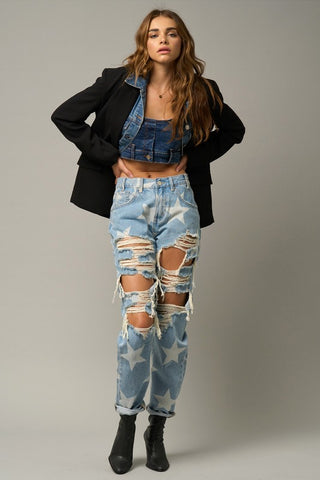 Sample wearing of a woman wearing her High-Waisted Star Print Ripped Jeans