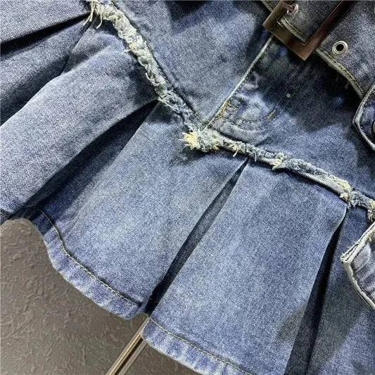 Fabric and Pleated Details of Denim Pleated Mini Skirt with Belt