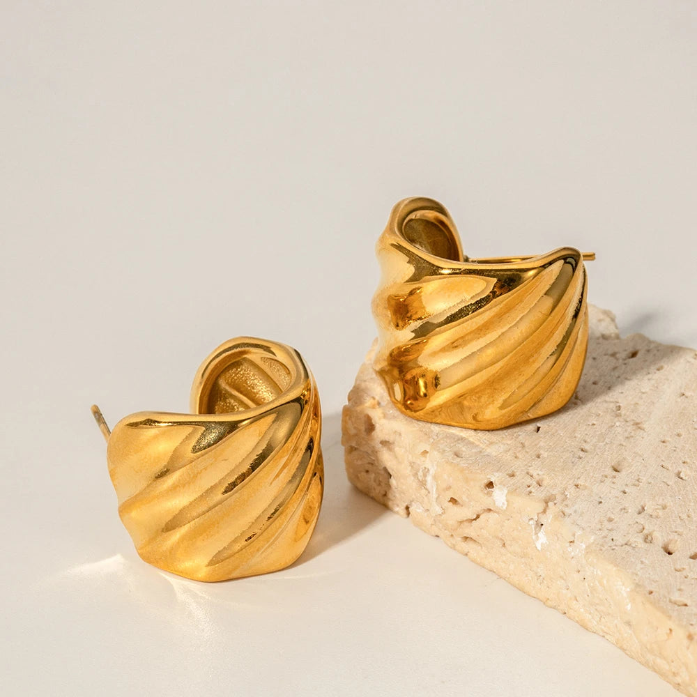 Close-up photo of Gold Plated CC Hoop Earrings