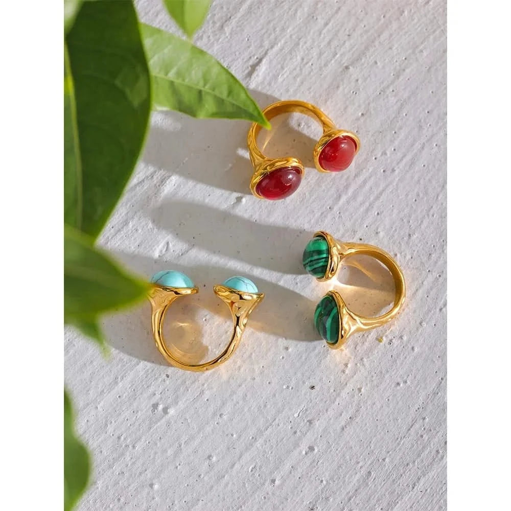 Aerial Shot of Two-Gemstone Gold Rings