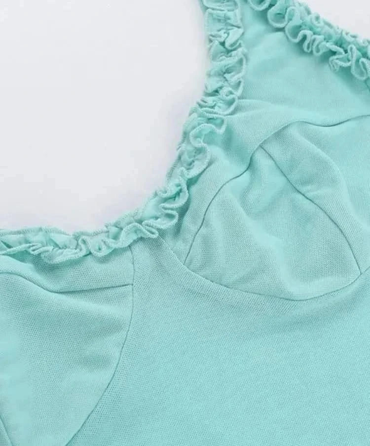 Fabric details of  White Sleeveless Ruffled Crop Tank Top - Mabel Love