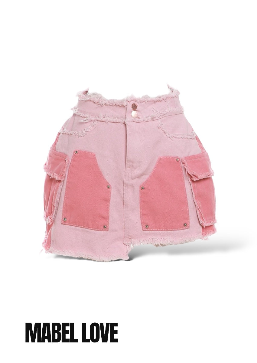 Image of a woman wearing her Pink Denim Mini Frayed Skirt with Cropped Top Jacket