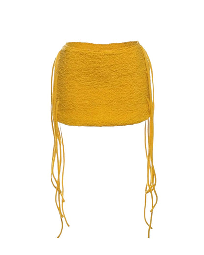 Yellow mini side skirt with tassels