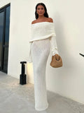 Woman wearing the white Knitted Off-Shoulde Maxi Dress