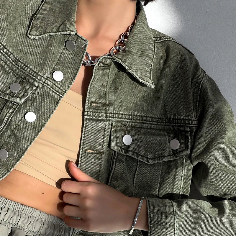 Close-up photo of a woman wearing Cropped Denim Jacket