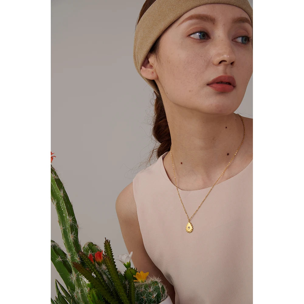 Woman wearing Gold Water-Drop Pendant Necklace