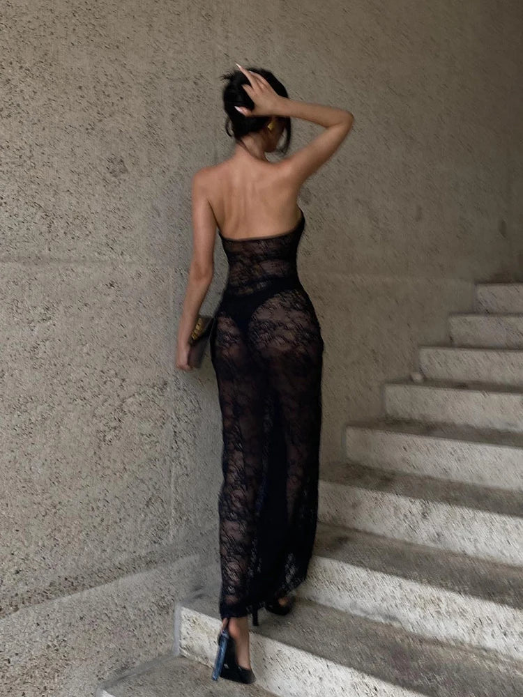 Woman wearing black Lace Hollow Out Ruched Maxi Dress