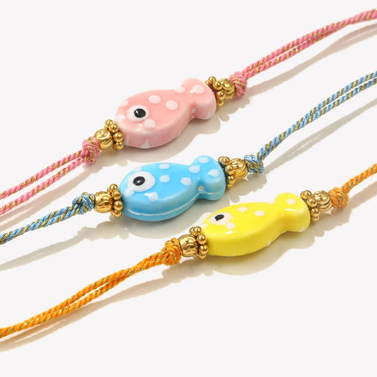 Colorful Fish Gold Bracelet – Summer Statement Piece - model wearing blue, new