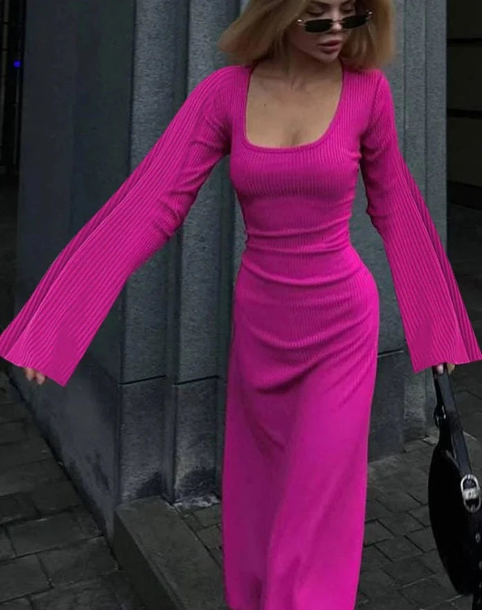 Women wearing the rose red Ribbed Maxi Dress with Trumpet Sleeves