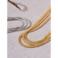 The hues of the Long Flat Snake Stacking Necklace are Platinum and Gold.