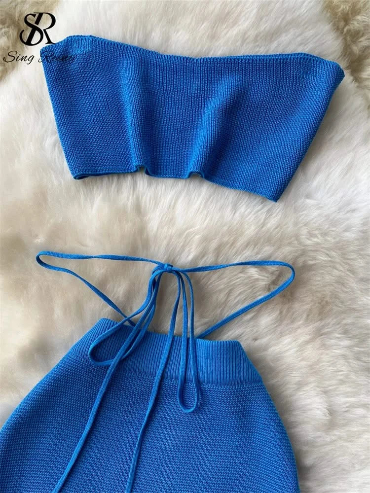 Conjunto de top corto sin tirantes y falda con abertura