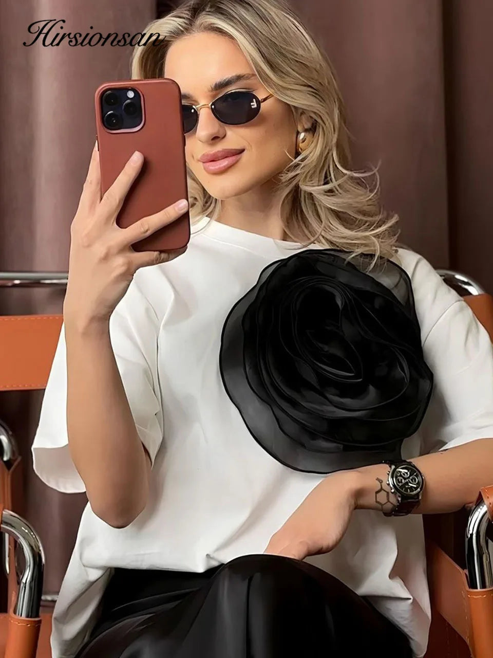 Woman taking a selfie while wearing her white Loose T-Shirt with 3D Big Flower