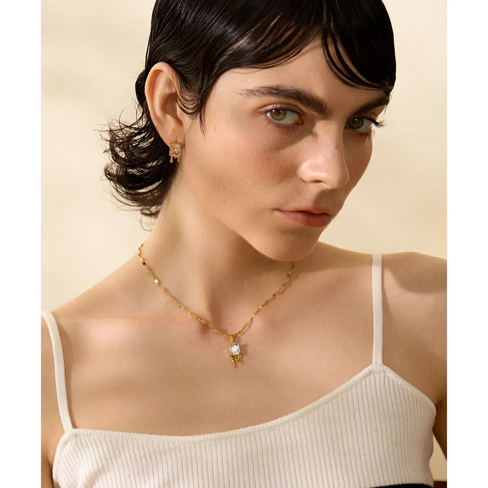 Woman wearing the Gold  Necklace with Geometric Cubic Zirconia Pendant