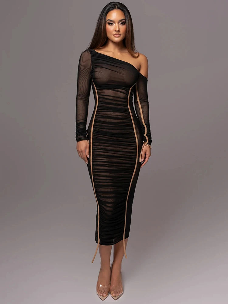 Woman wearing the black Asymmetrical Midi Dress with Ruched Design