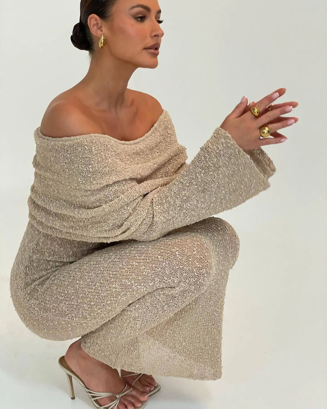 Woman wearing the Khaki Color Knitted Off-Shoulde Maxi Dress