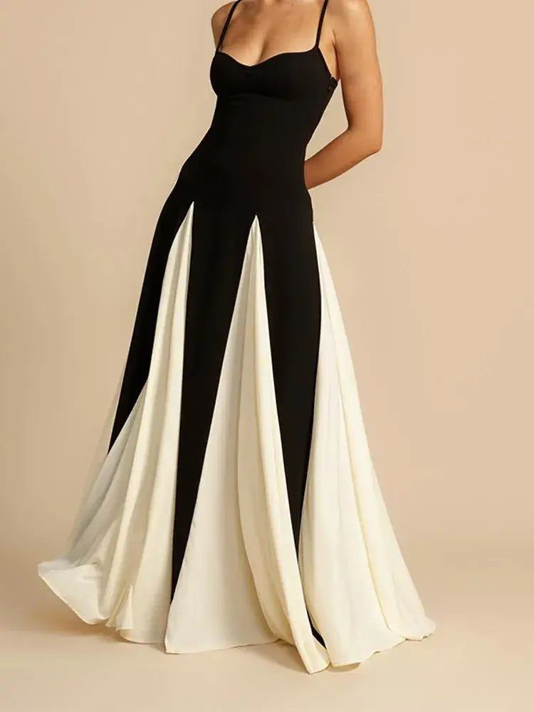 Woman wearing her black and white Panelled Tulle A-line Slip Maxi Dress