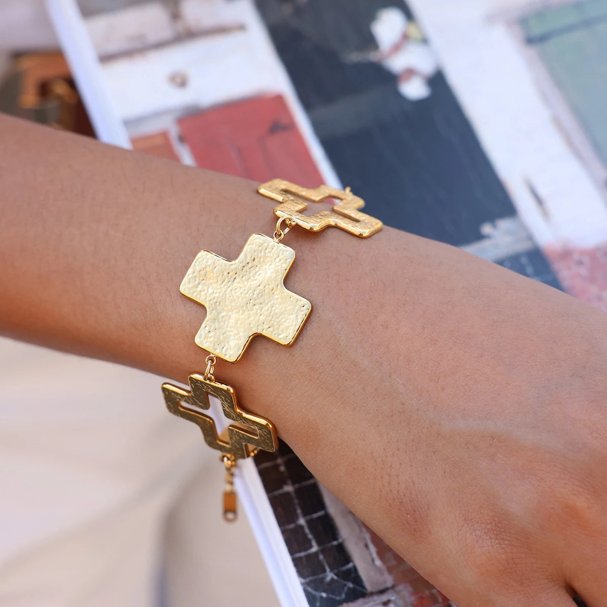 Your World Babe Gold Cross Stainless Steel Bracelet - model wearing bracelet and necklace