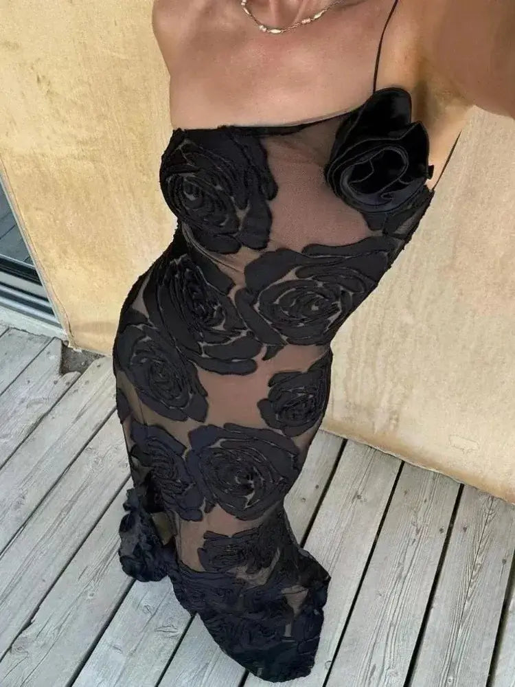 Woman wearing her Asymmetric Black Floral Maxi Dress