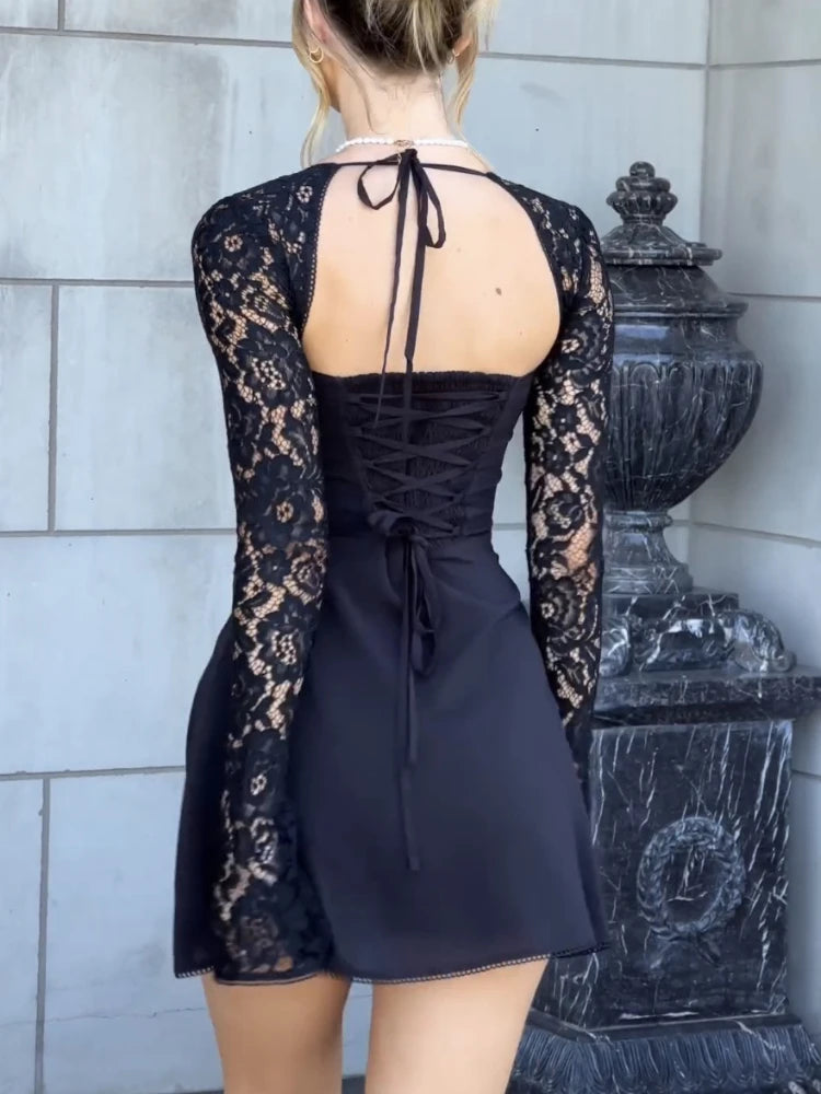 Back Angle of a Woman wearing Mini Dress with Black Lace Patchwork Long Sleeves