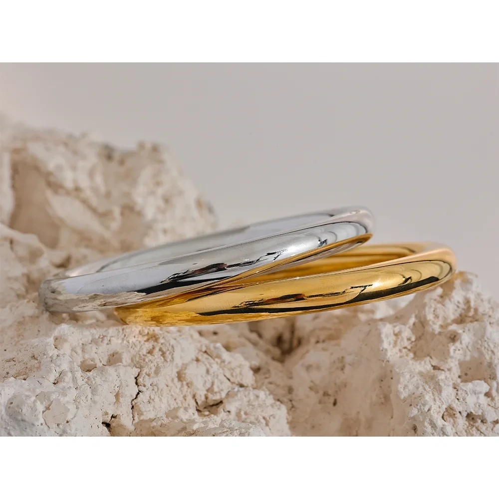 Side detail shot of Gold and Silver Plain Bangles