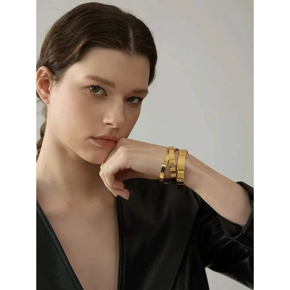 Woman wearing her Gold Multiple Bangles