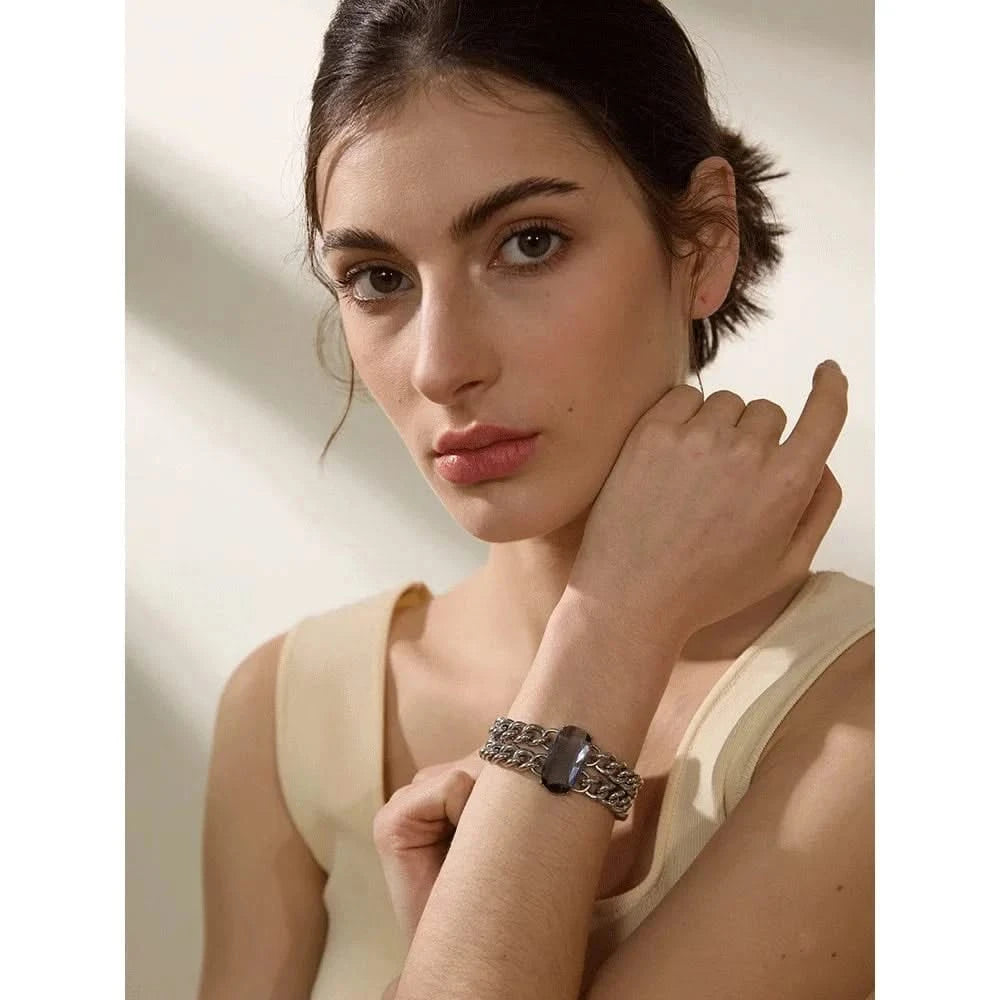 Woman wearing her Silver Chain Bracelet with Black Gemstone