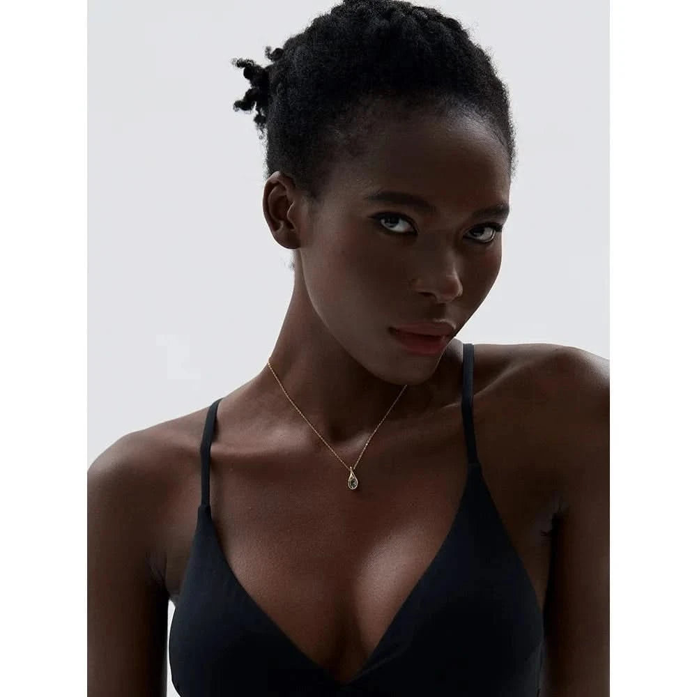 Woman wearing her Water Drop Pendant Necklace