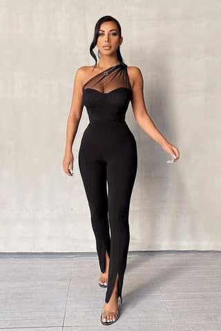 Full shot image of a woman wearing her high-waisted black flare slit pants, which may be combined with any top. 