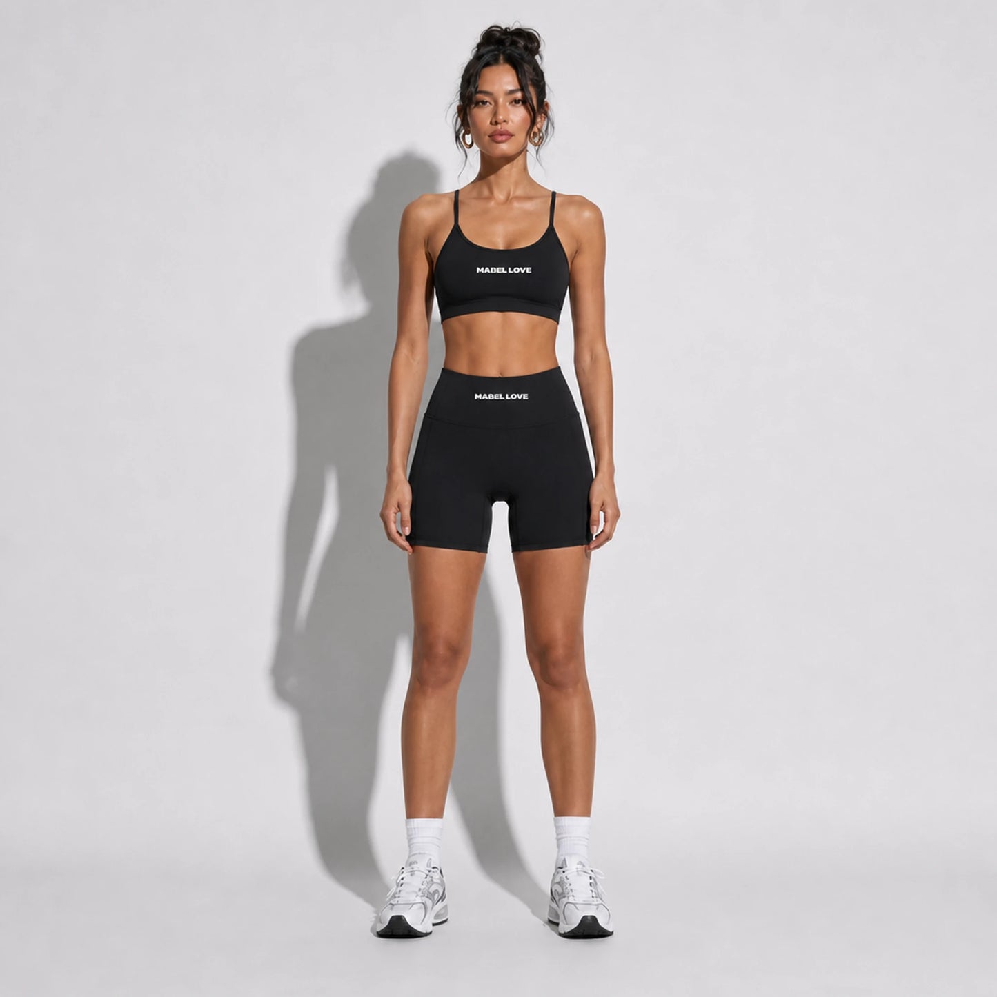 Set — Infinity bra + Legging Shorts black front on-model 2048