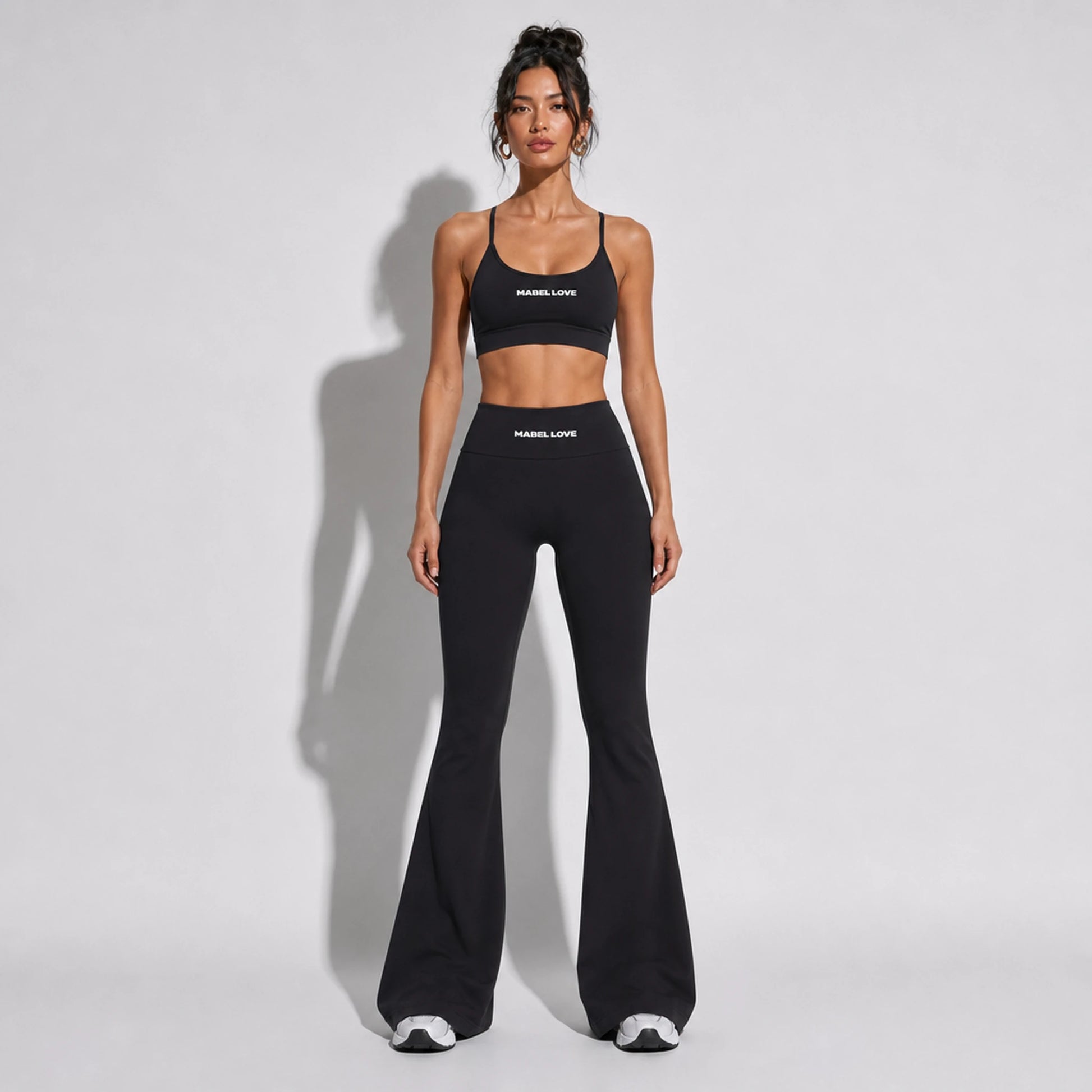 Set — Infinity bra + Scrunch Butt Leggings black front on-model 2048 (floor-length flare)