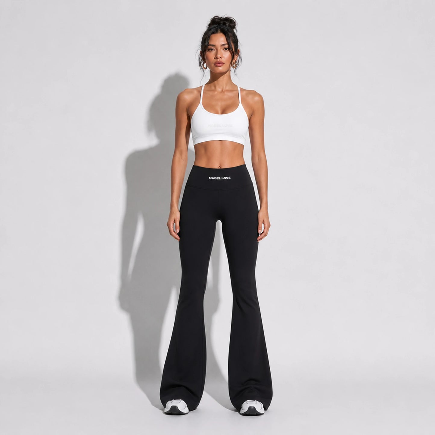 Set — Infinity bra white + Scrunch Butt Leggings black front on-model 2048 (floor-length flare)
