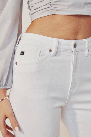 Close-up details of White High-Rise Skinny Jeans