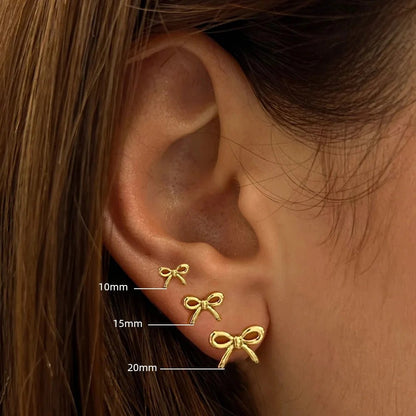 Gold Ribbon Stud Earrings - Sample wearing