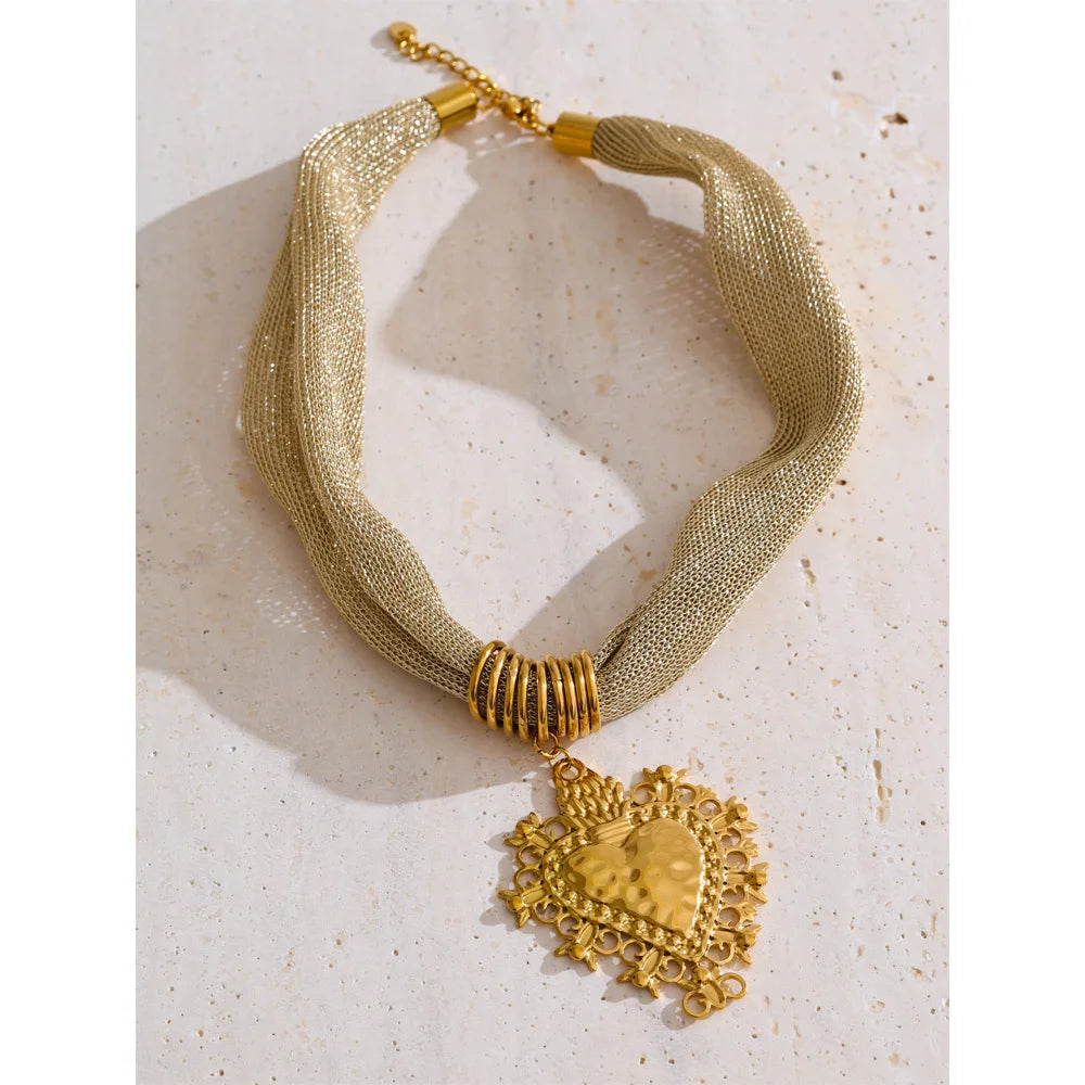 statement multi-strand mesh necklace with a heart-shaped pendant