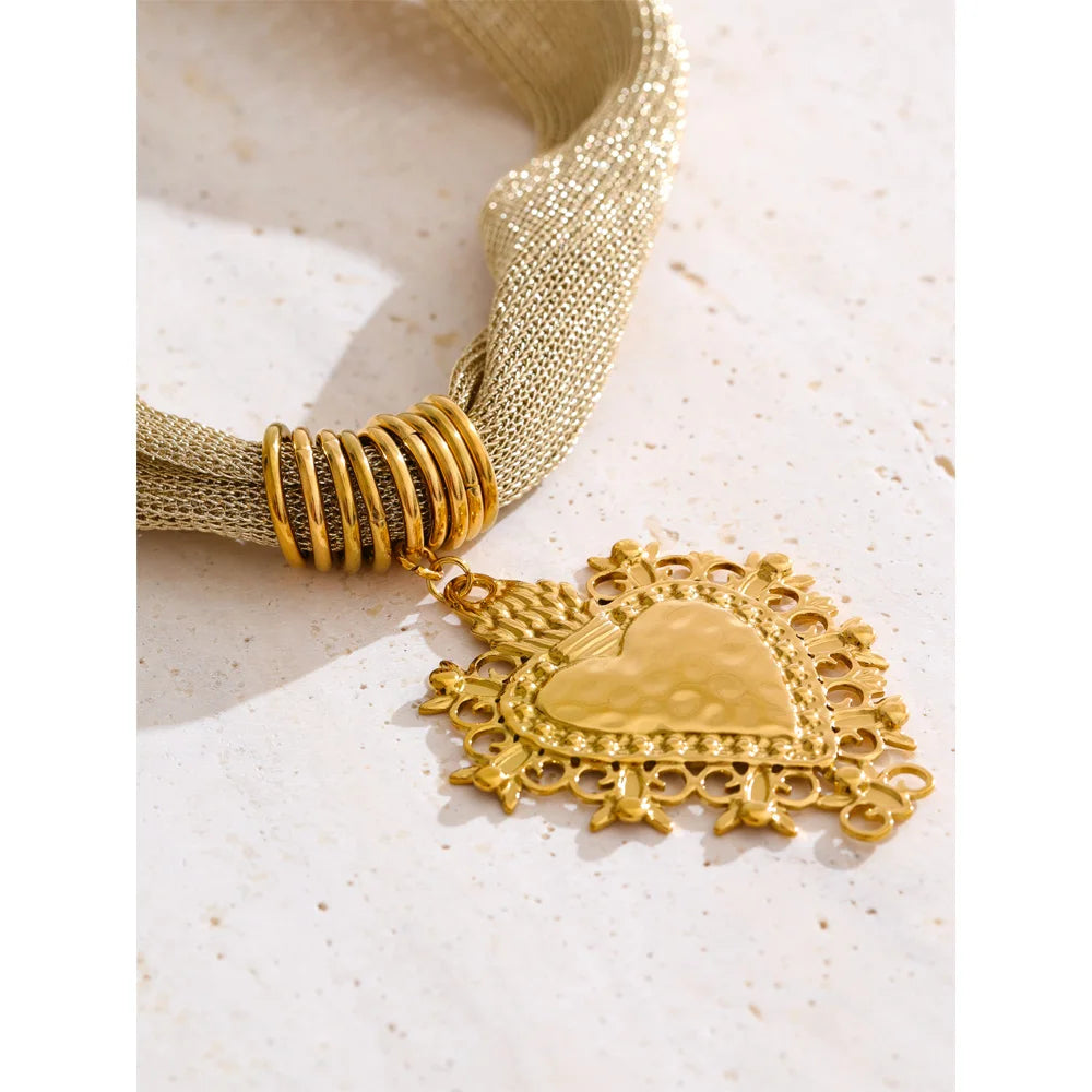 statement multi-strand mesh necklace with a heart-shaped pendant