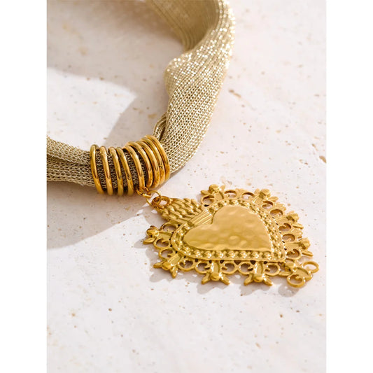 statement multi-strand mesh necklace with a heart-shaped pendant