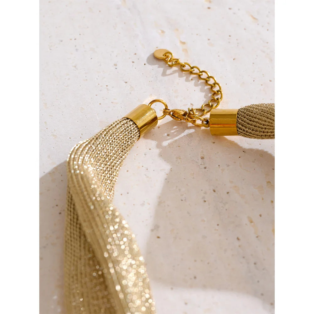 statement multi-strand mesh necklace with a heart-shaped pendant