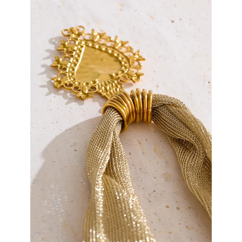 statement multi-strand mesh necklace with a heart-shaped pendant