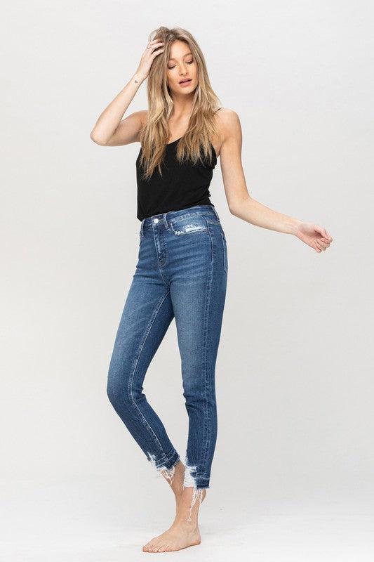 Woman wearing her Distressed Hem Skinny Jeans